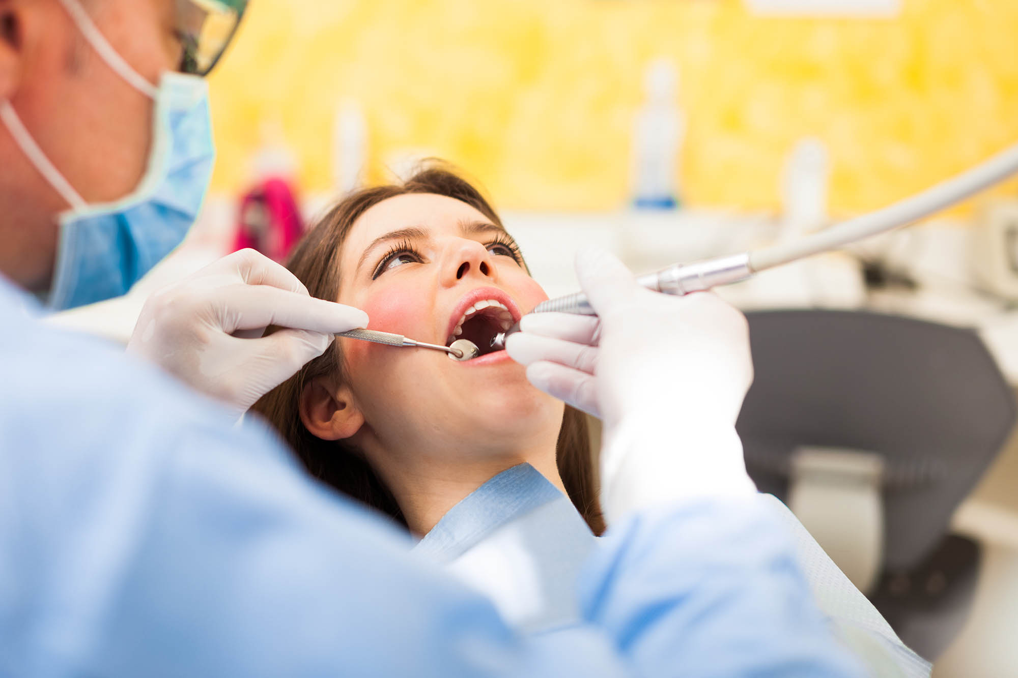 Woman receiving a dental treatment